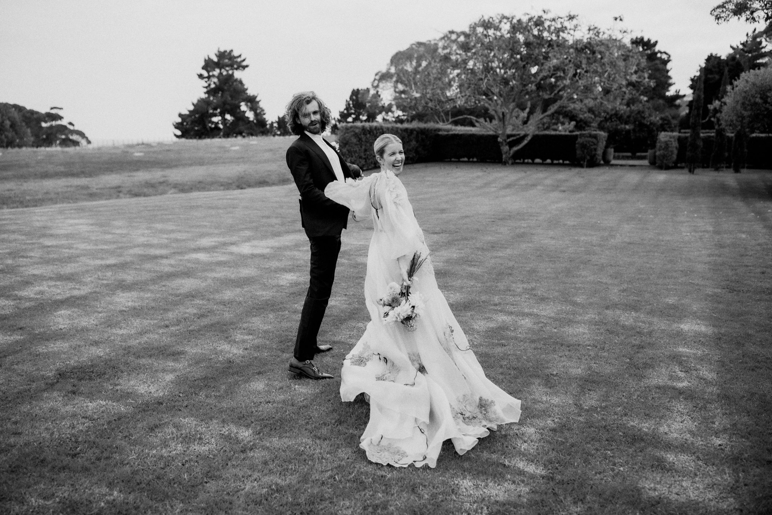 Bride and groom walking together hand in hand at intimate Hawke's Bay Wedding Ana Galloway Photography