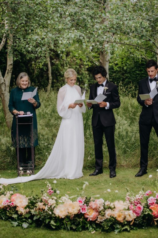 Bride and Groom singing hymms during wedding ceremony Ana Galloway Photography