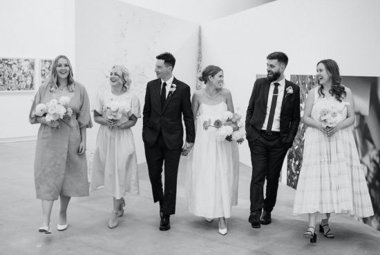 Bride and groom and bridal party in art gallery Christchurch Wedding Ana Galloway Photography