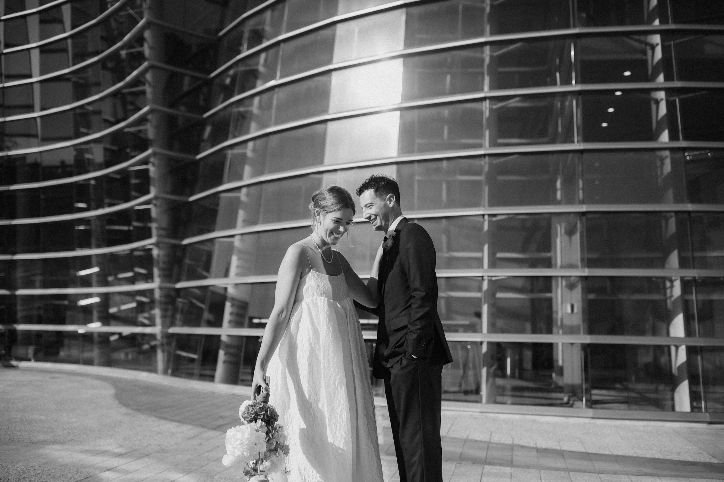 Bride and groom in art gallery during first look before ceremony Christchurch Wedding Ana Galloway Photography